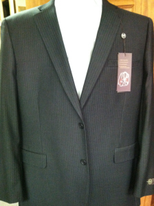 A suit that is on display in the store.